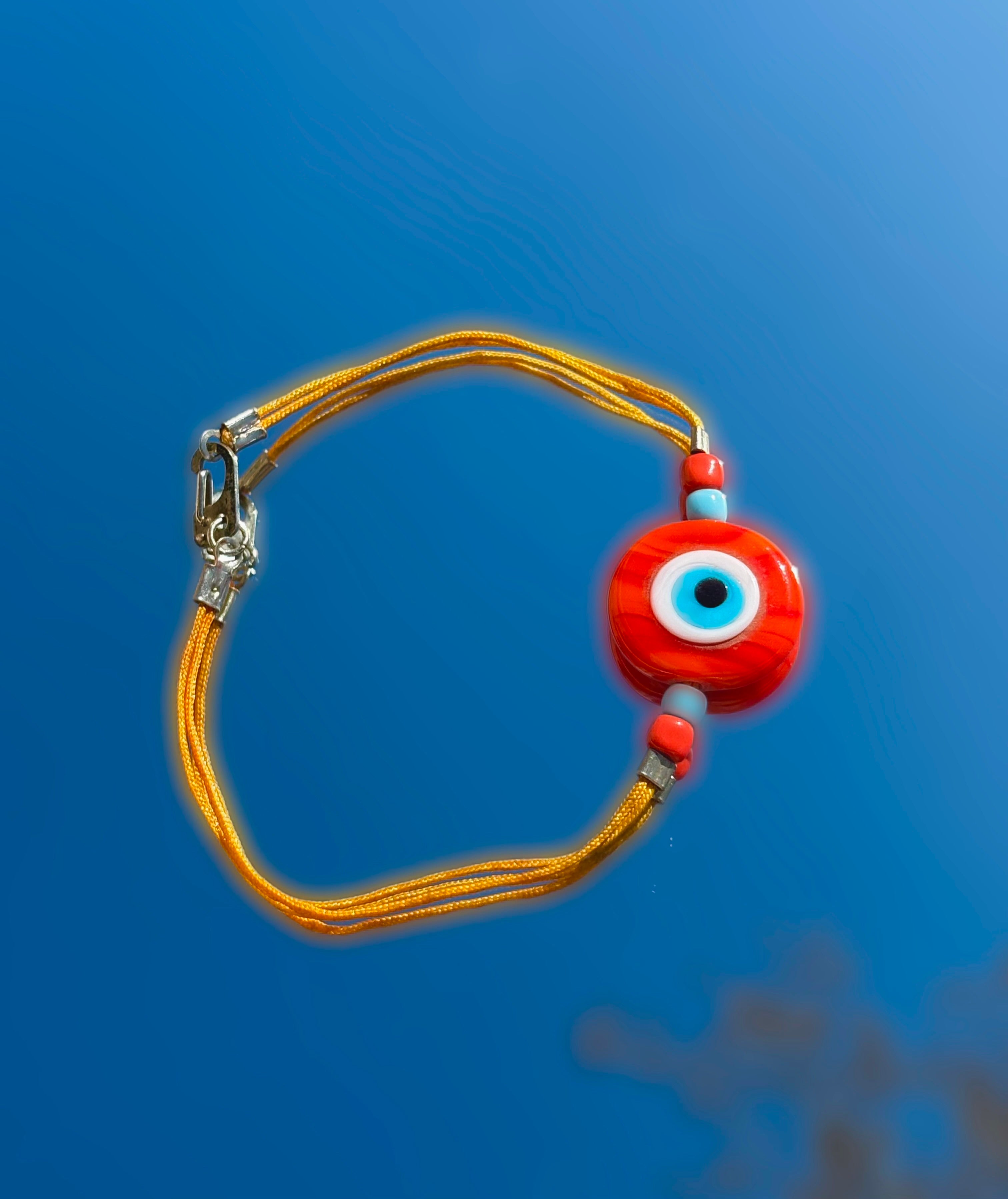Bracelet-cordon-orange-oeil
