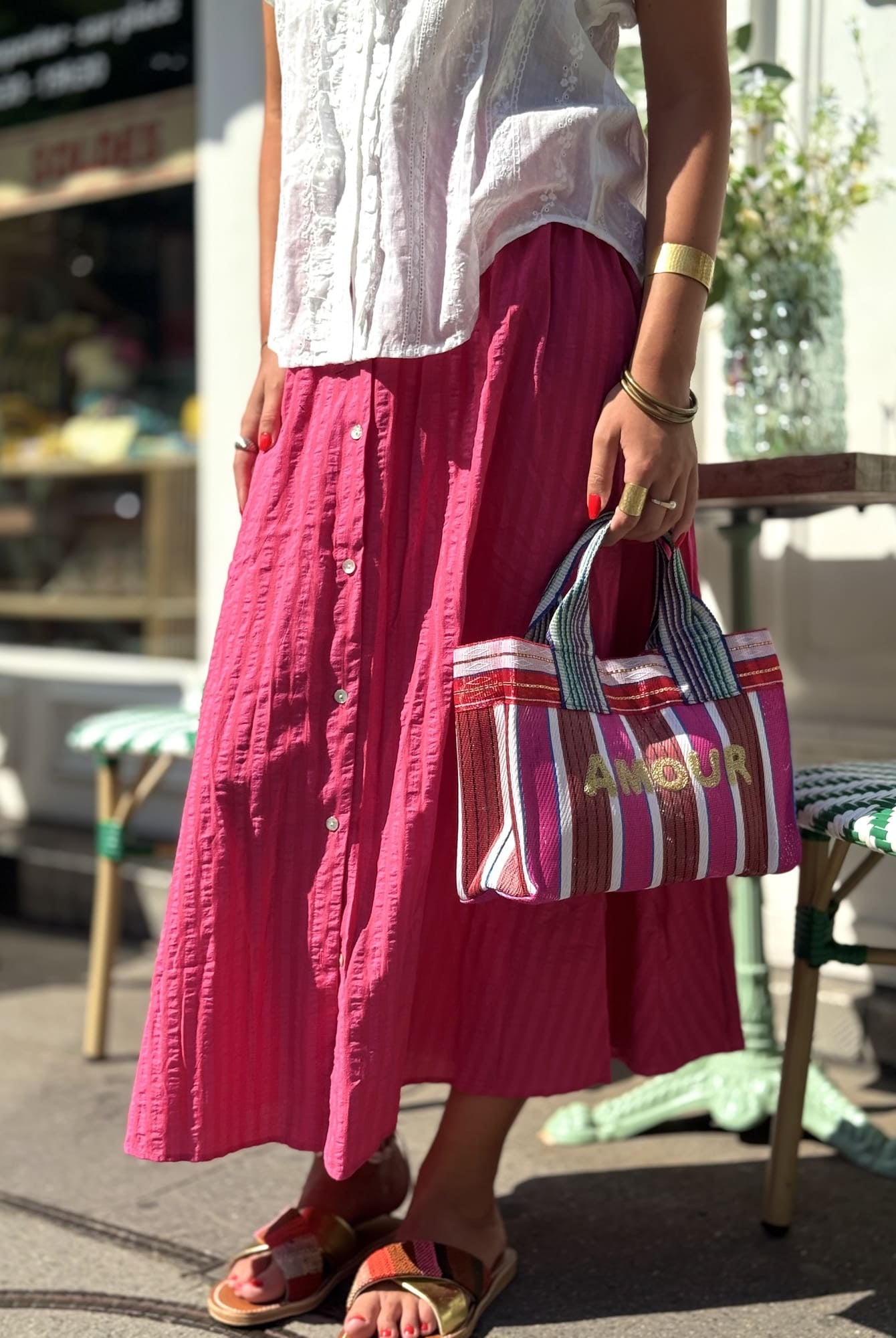 Jupe rayée fuchsia vue de profil portée - Sidonie Concept Store