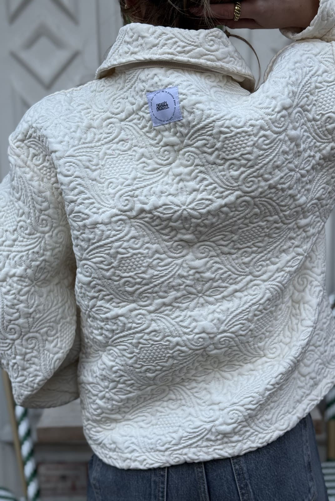 veste boutis blanche de dos