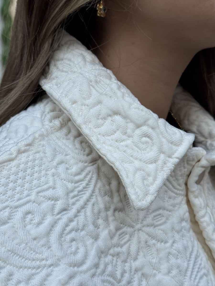 veste boutis blanche de pres