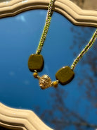 Collier cordon avec un masque indien