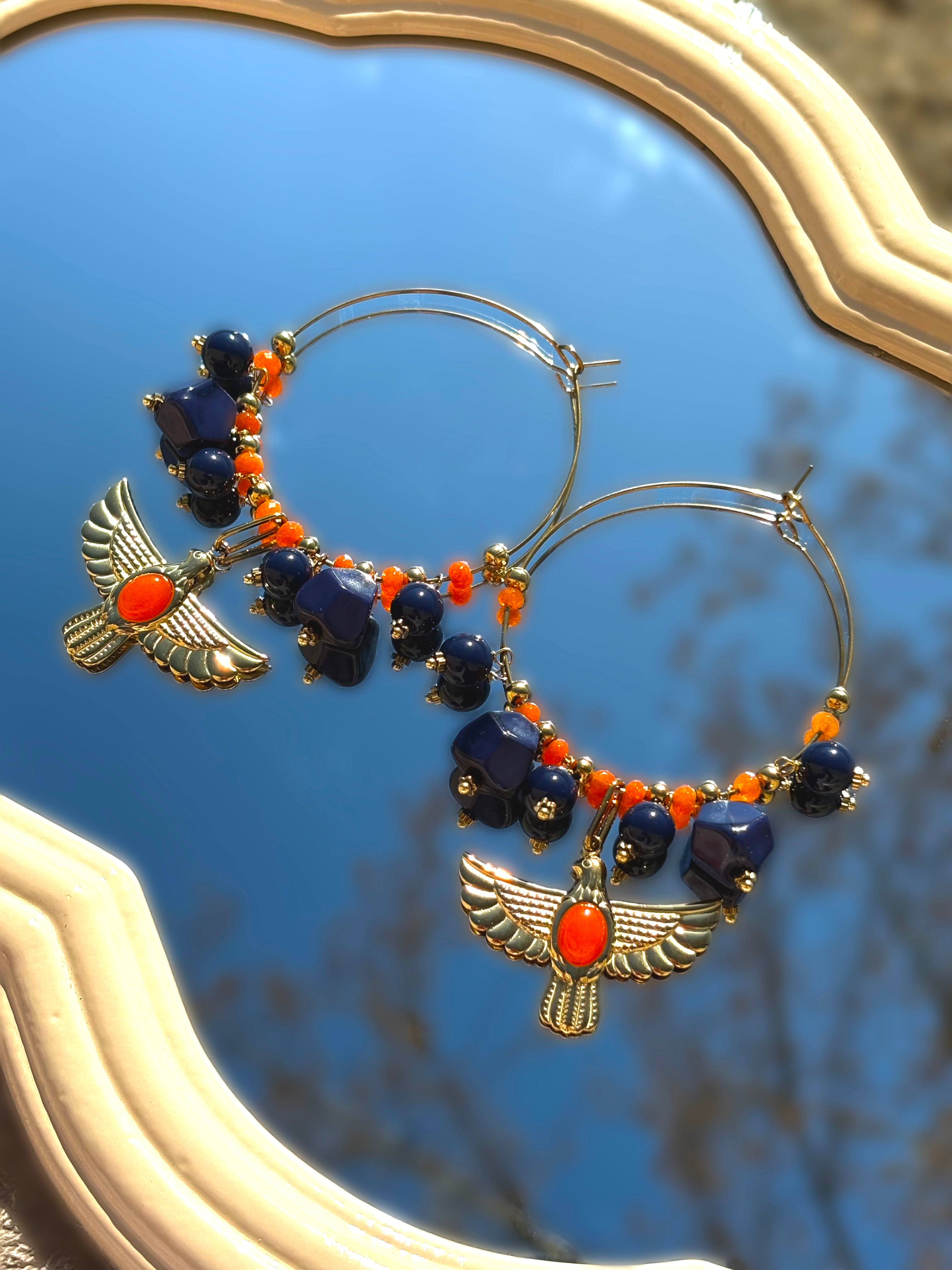 Boucle d'oreille créole à breloque aigle