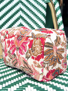 Trousse matelassée imprimé fleurs rouges
