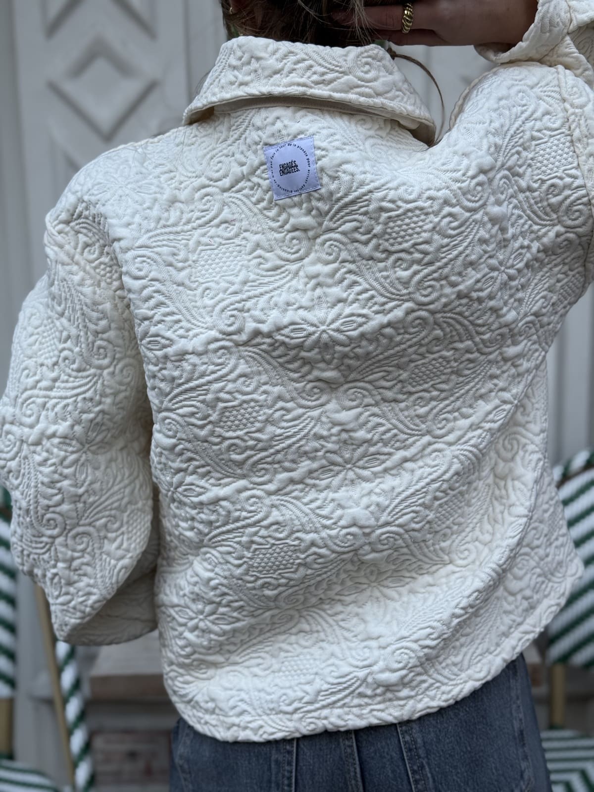 veste boutis blanche de dos