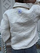 veste boutis blanche de dos